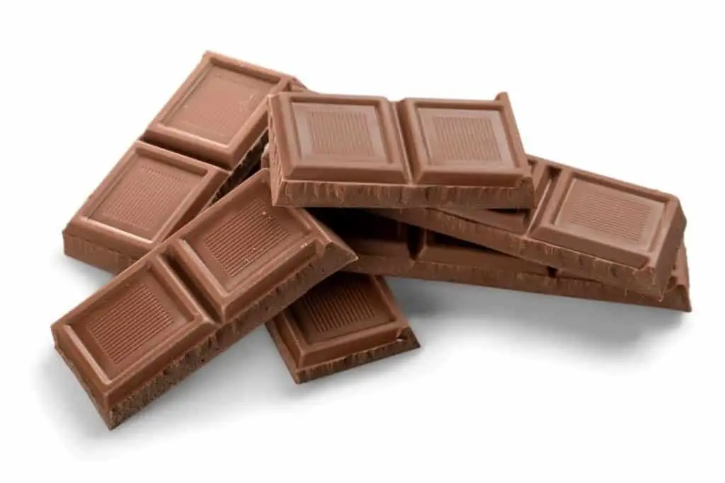 Chocolate. Cocoa, the primary ingredient in chocolate, contains theobromine. While a mild stimulant in humans, this can be lethal for dogs because their bodies process it slower. 